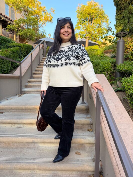 Winter white and black fair isle sweater and black pants